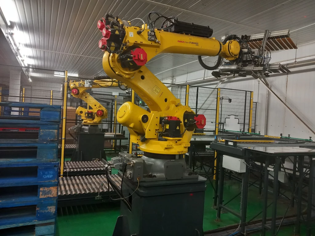 Palettisation robotisée chez Pilgrim’s Europe Cellule robotisée de palettisation en site agroalimentaire froid positif